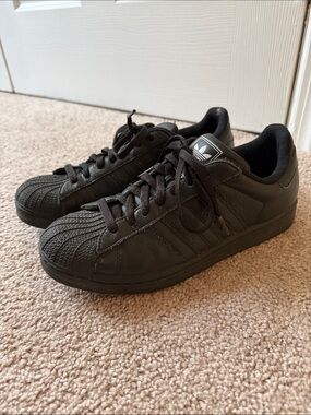 adidas All Black Low-Top Shell Toe Sneakers